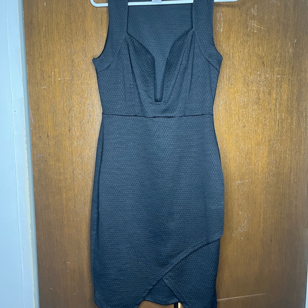 Deep cut little black dress